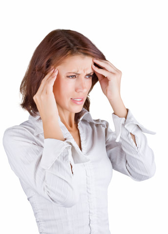 Lady suffering migraine and tension-type headache.